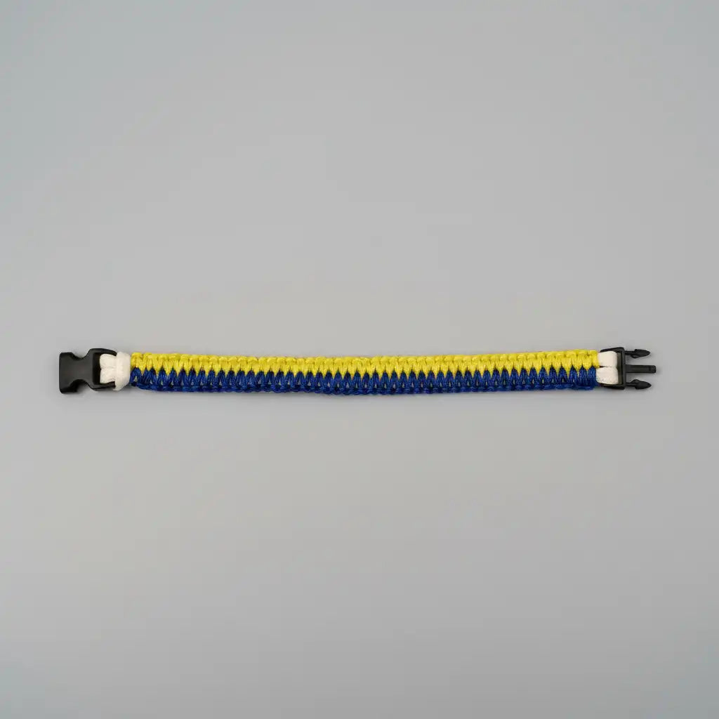 Bracciale Phantom Glow in Microcord blu e giallo con anima bianca fotoluminescente