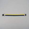 Bracciale Phantom Glow in Microcord blu e giallo con anima bianca fotoluminescente