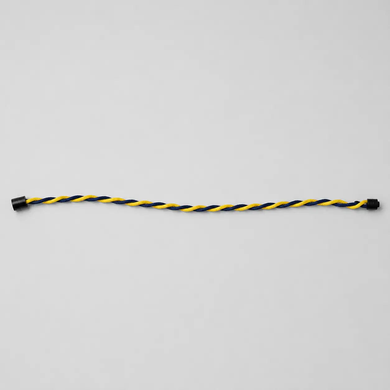 Collana Twist in Paracord blu e giallo distesa per mostrare la lunghezza