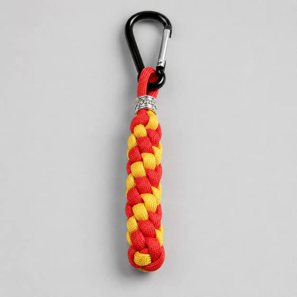 Portachiavi rotondo in Paracord giallo e rosso intrecciato a mano